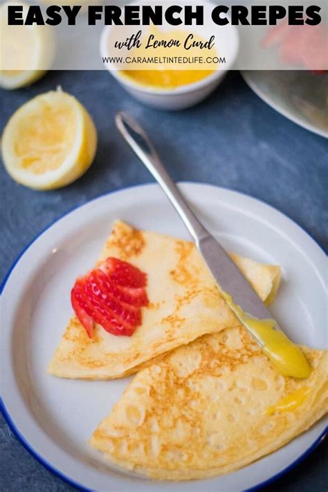 Crepes With Strawberries On Top And Lemons In The Background Are Ready