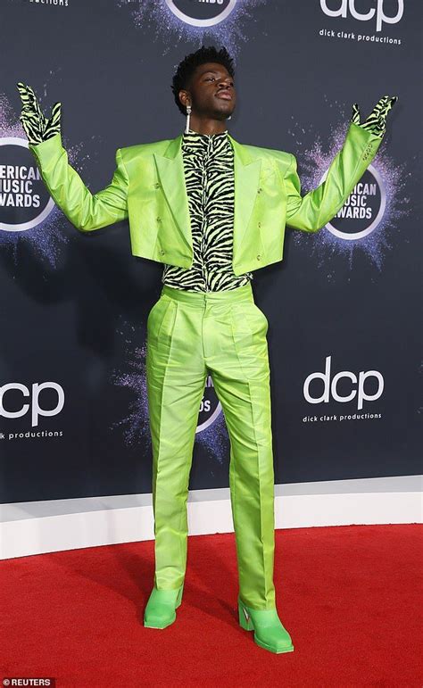 Dandyism Rapper Lil Nas X At The American Music Awards 2019 Neon Outfits Futuristic