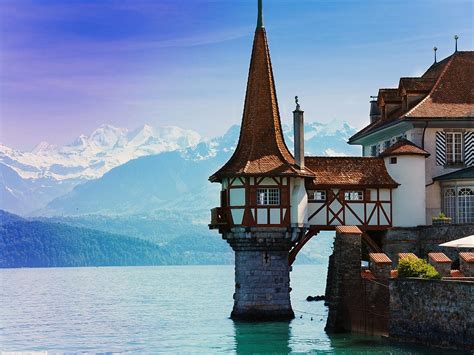 This Oberhofen Castle With Its Tower On The Water Lies On The Right