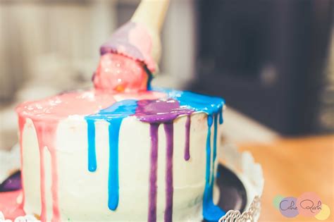Rainbow Cake With Melted Ice Cream Topping Cake Quirk