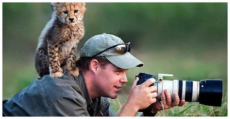 View Adorable Photos Of Animals Getting Up Close With Wildlife