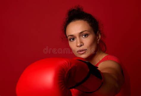 Close Up Of Concentrated Young African Athletic Woman Boxer In