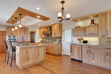 Among other kitchen cabinet wood types, while pine is cheaper, mahogany is quite premier! Kitchen - red birch cabinets, quartz and live wood edge ...