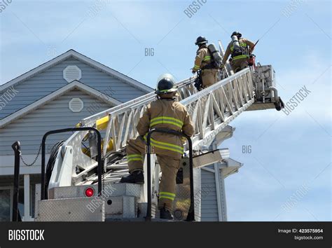 Three Firefighters Image And Photo Free Trial Bigstock