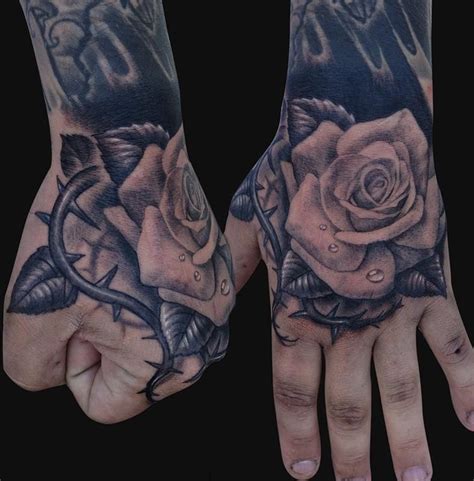 Hand Tattoos Hand Rose Tattoo Design Of Tattoosdesign