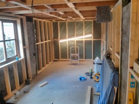 If someone could figure out how to retrofit insulation onto a sheetrocked garage ceiling, that would be great. Grogley Junction: The Garage (Modelling Room) update