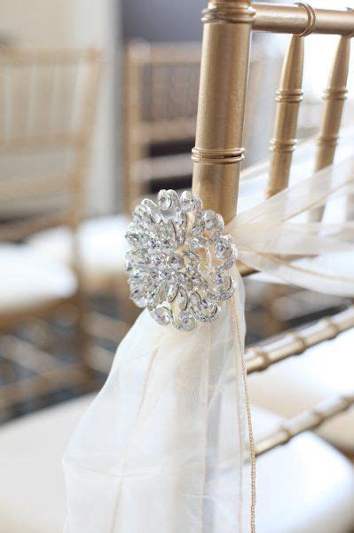 50 Ways To Use Brooches For Wedding Decor Wedding Chair Decorations
