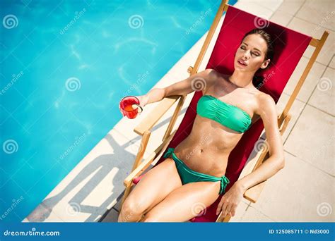 Woman Sunbathing At Swimming Pool Stock Image Image Of Human People