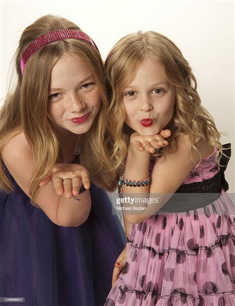 Actresses Natalie Alyn Lind And Emily Alyn Lind Pose At A Photo Shoot