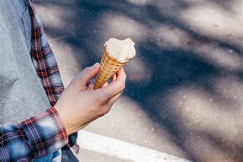 Hand Holding Ice Cream Cone By Stocksy Contributor Jesse Morrow