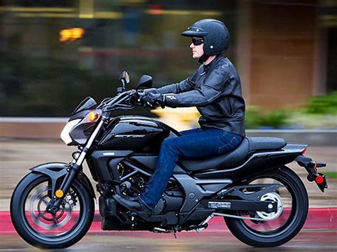 Curb weight measures 494 pounds, and 516 pounds with the abs and dct setup. Buy 2014 Honda CTX700N DCT ABS on 2040-motos