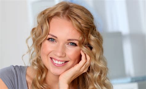Smiling Beautiful Woman With Blonde Hair