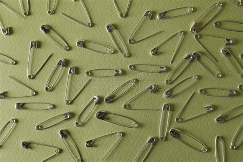 Many Safety Pins On Green Background Flat Lay Stock Photo Image Of