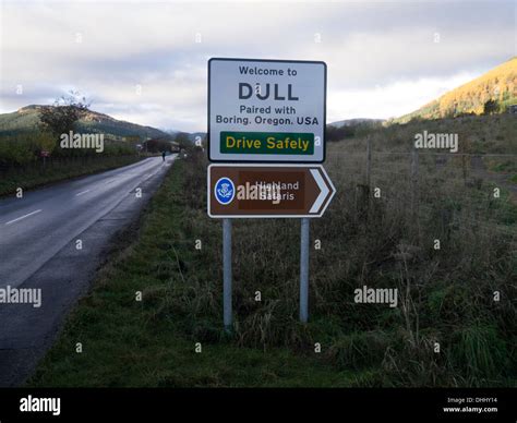 an amusing town sign dull paired with boring oregon dull is town near aberfeldy scotland stock