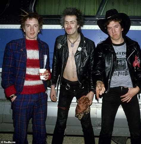 1970s Double Decker Bus And Classic Cars Are Seen On Set Of Sex Pistols