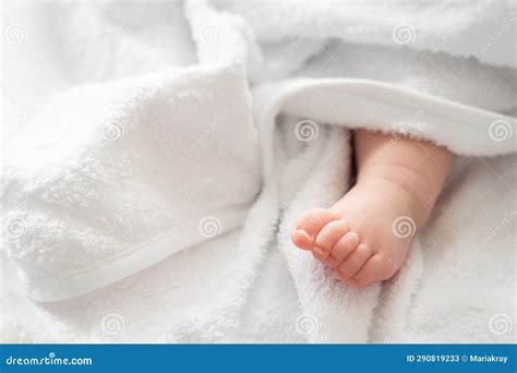 Infant S Imprint Baby Foot Shyly Emerging From White Fabric Stock