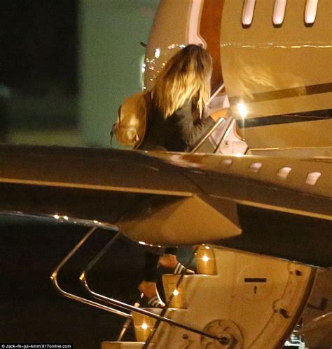 picture exclusive khloe kardashian and a happy and healthy lamar odom board a private jet to