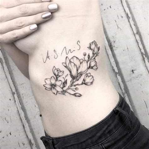 Freehand purple pink magnolia tattoo. 44 Beautiful Magnolia Tattoo Designs | TattooAdore