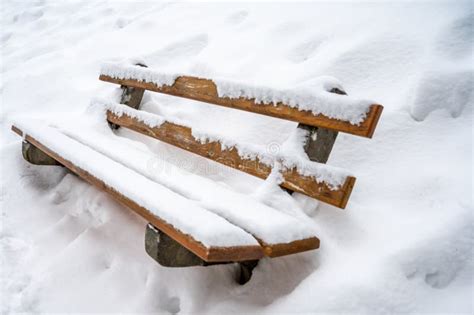 Snow Covered Bench Deep Snow In Winter Tranquil Scene Stock Photo