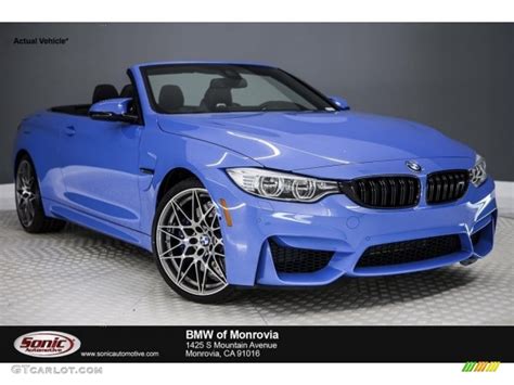 This m4 convertible is $1,100 below kelley blue book! 2017 Yas Marina Blue Metallic BMW M4 Convertible ...