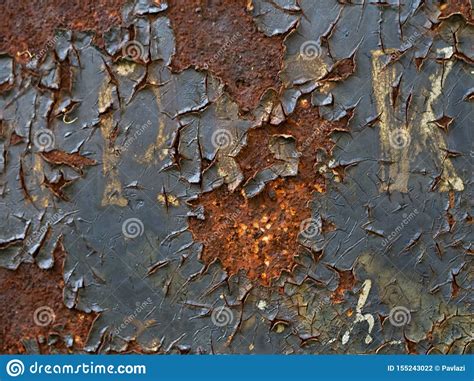 Rusted Metal Signboard With Peeling Paint And Illegible Inscription