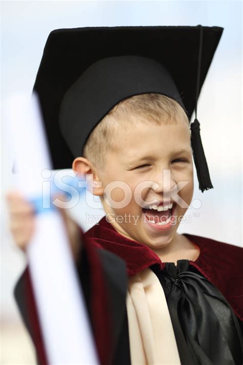 Boy Graduate With A Diploma Stock Photo Royalty Free Freeimages