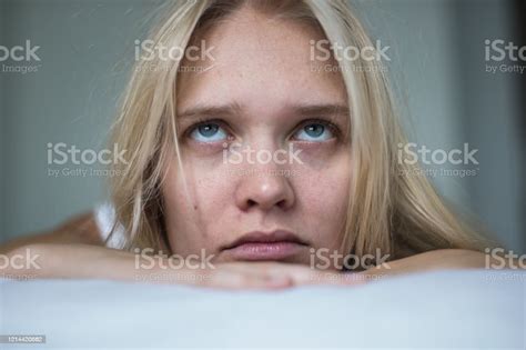 Depressed Bored Woman Lying In Bed At Home Stock Photo Download Image