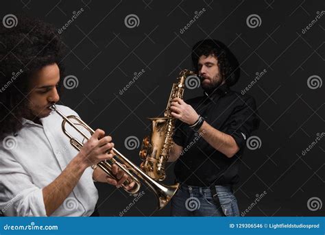 Duet Of Musicians Playing Trumpet And Saxophone Stock Photo Image Of