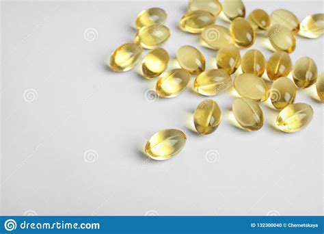 Cod liver oil can help make hair healthy and strong. Cod liver oil pills stock photo. Image of capsule, care ...