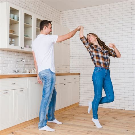 Free Photo Happy Couple In Love Dancing In Kitchen