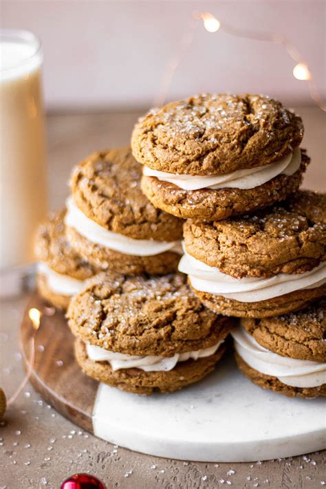 gingerbread cookie sandwiches with browned butter cream cheese frosting