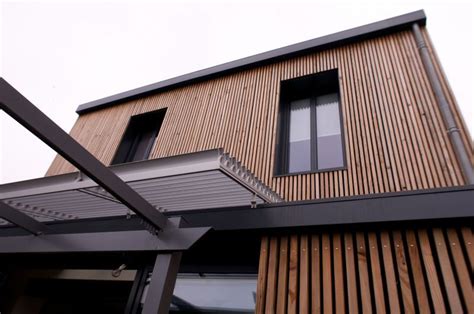 Maison maçonnée bardée en bois à claire voie Etude et réalisation faite