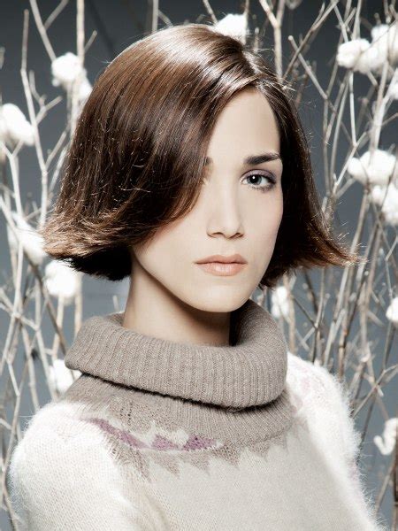 Long Textured Bob For Brown Hair Styled With A Deep Dip To The Side
