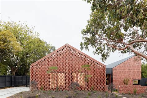 A Pair Of Single Storey Townhouses Take Inspiration From The
