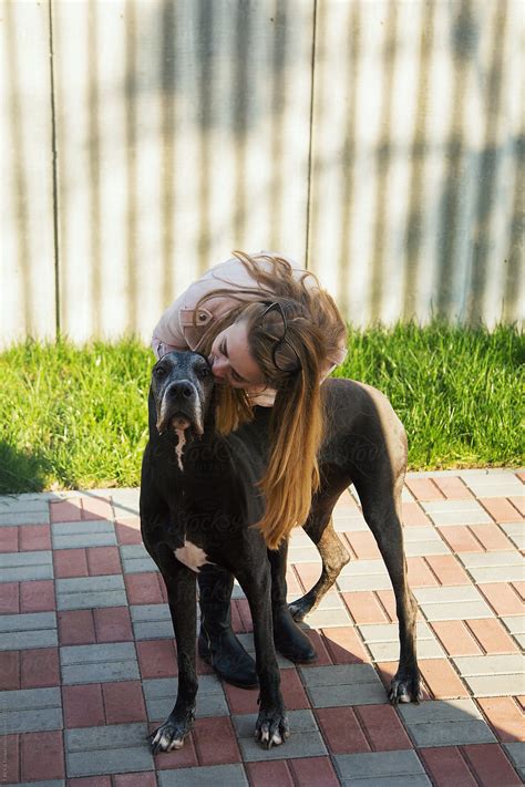 Tender Woman Kissing Dog By Stocksy Contributor Danil Nevsky Stocksy