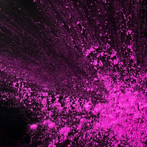 Free Photo Pink Dust Particles Splash Against Black Background
