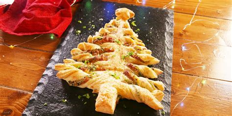 Unroll both pastry sheets onto baking tray, and use a pizza cutter or knife to cut a christmas tree shape into the dough; Pizza Dough Spinach Dip Christmas Tree Recipe : Bacon Brie ...