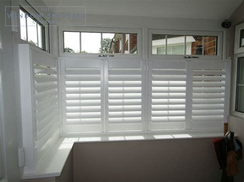Easy to operate, clean and maintain. Café shutters for box bay windows in porch in Uckfield