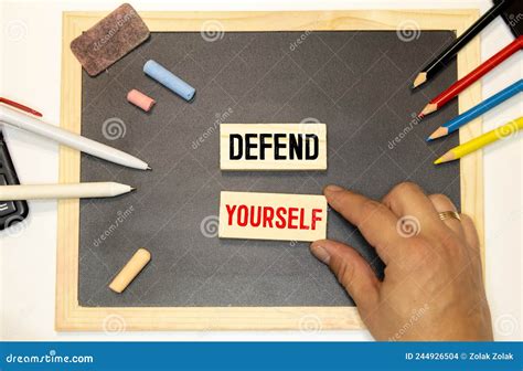 Man Puts Together The Phrase Defend Yourself Stock Photo Image Of
