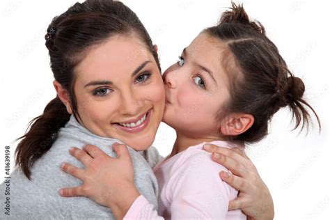 Babe Girl Kissing Her Mother Stock Photo Adobe Stock