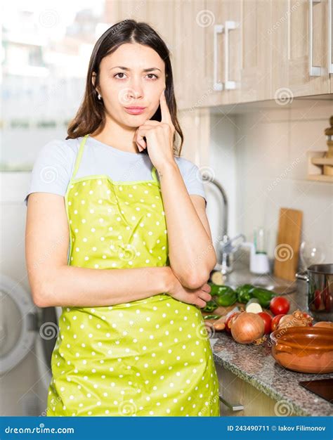 Young Girl Housewife In Apron Looking Tired At Kitchen Stock Image Image Of Adult Casual