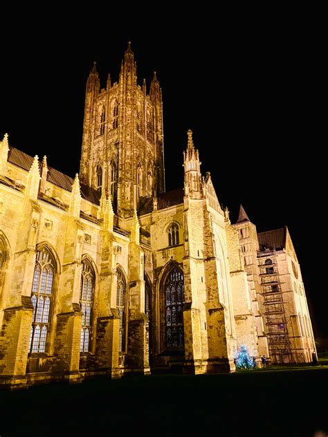 Download Canterbury Cathedral Glowing At Night Wallpaper