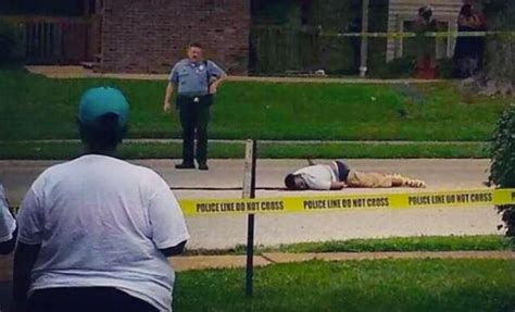 Disturbing Photos And Video Footage Show Mike Browns Body Lying In The Street