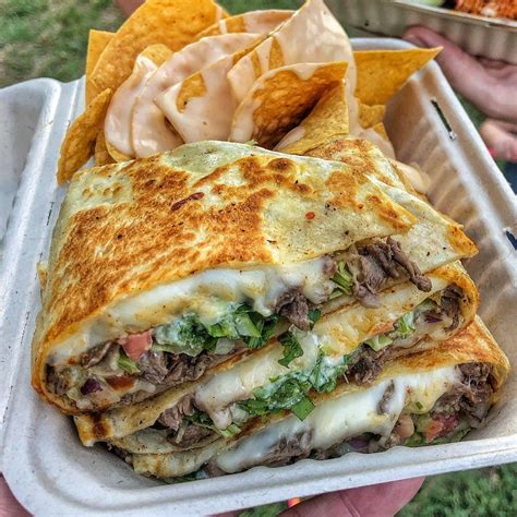 12 inch flour tortilla with mexican rice, pinto beans, onions, cilantro, salsa verde, cheese, sour cream, and your choice of meat. Andy Carr on Instagram: "#tbt to food trucks with family ...