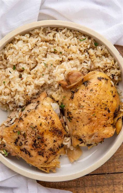 The secret to juicy oven baked chicken breast is to add a touch of brown sugar into the seasoning and to cook fast at a high temp. Oven Baked Chicken and Rice is a family friendly and ...