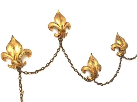 Rated 4.65 out of 5 stars. Italian Fleur De Lis Gold Gilt Wall Sconce Lamp at 1stdibs
