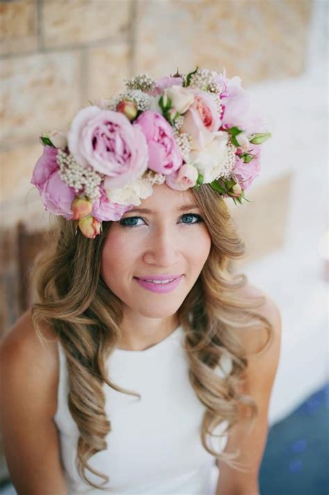 A Woman Wearing A Flower Crown On Her Head