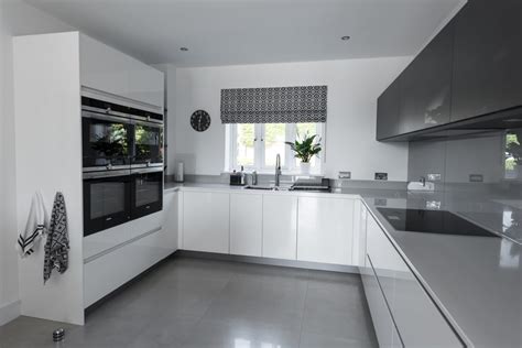 Light grey kitchen with white quartz worktops suffolk. Dark Cement and Gloss Light Grey Contemporary Kitchen with ...