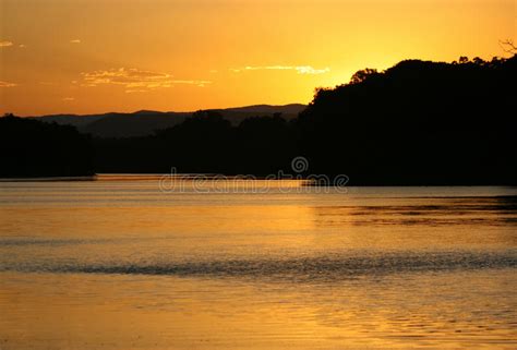 Orange Gold Sunset Sky Over Water Stock Photo Image Of