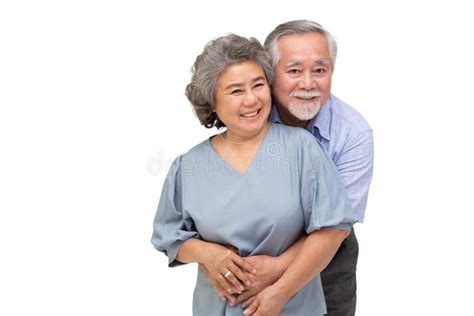 Senior Couple Hugging Together Isolated Over White Background Stock